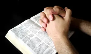 Free praying hands open book