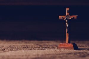 brown wooden cross on the table